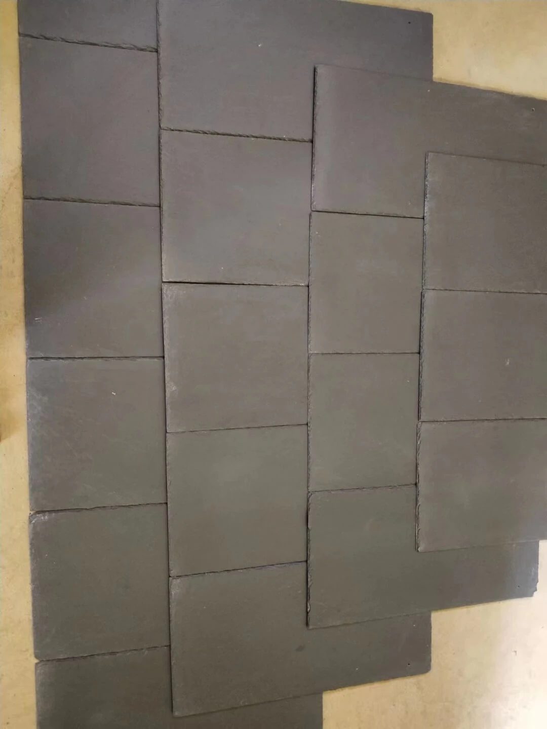 black slate tiles, the company's own listing photograph