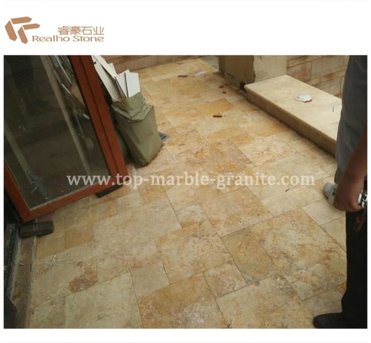 biege travertine flooring with Versailles pattern, the company's own listing photograph